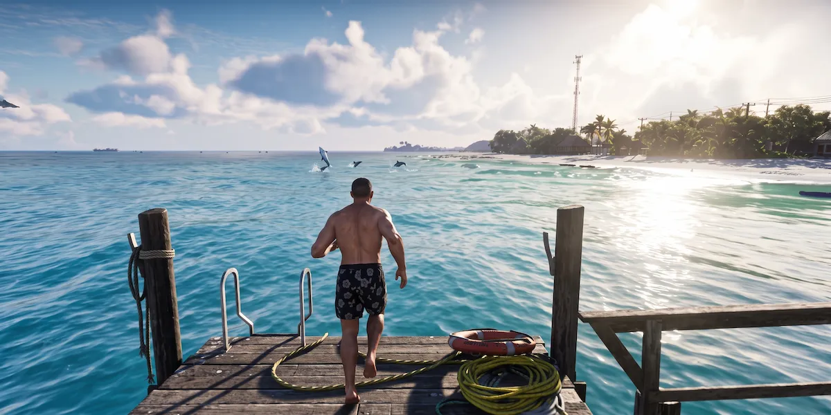 Personagem em um píer de madeira olhando para o mar cristalino com golfinhos saltando em uma praia de GTA 6, demonstrando a simulação e física de água da RAGE Engine.